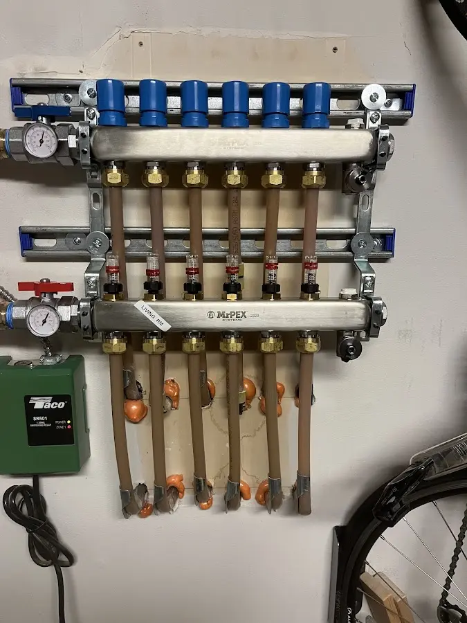 Plumber performing Gas Line Installation at a residential property in Woodway